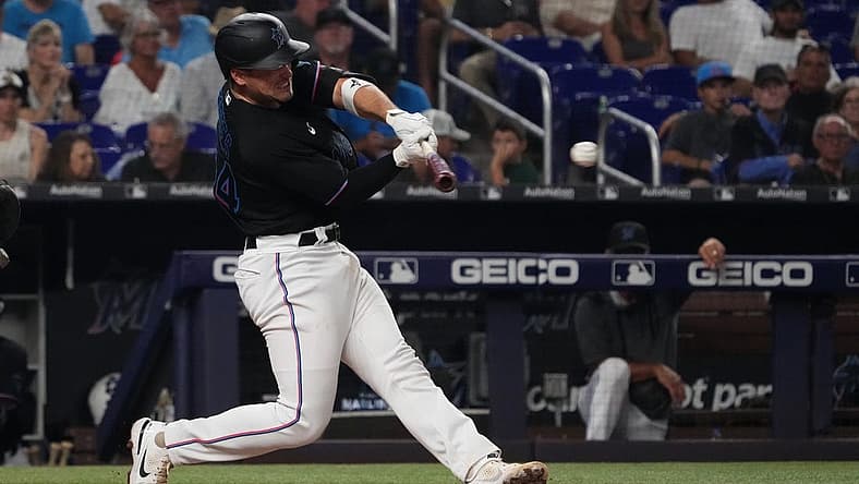 Sep 9, 2022; Miami, Florida, USA; Miami Marlins catcher Nick Fortes (54) singles in the fourth inning against the New York Mets at loanDepot park. Mandatory Credit: Jasen Vinlove-USA TODAY Sports