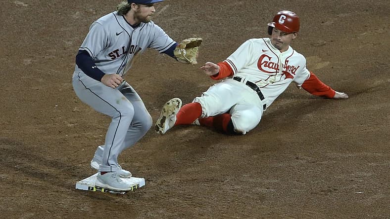Sep 9, 2022; Pittsburgh, Pennsylvania, USA; St. Louis Cardinals second baseman Brendan Donovan (left) takes a throw to force Pittsburgh Pirates center fielder Bryan Reynolds (right) out at second base during the fifth inning at PNC Park. Mandatory Credit: Charles LeClaire-USA TODAY Sports