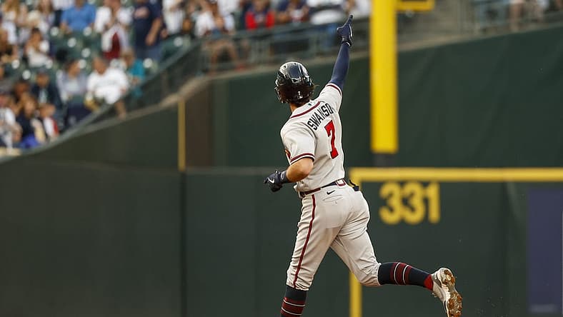 Sep 9, 2022; Seattle, Washington, USA; Atlanta Braves shortstop Dansby Swanson (7) celebrates as he runs the bases after hitting a two-run home run against the Seattle Mariners during the first inning at T-Mobile Park. Mandatory Credit: Joe Nicholson-USA TODAY Sports