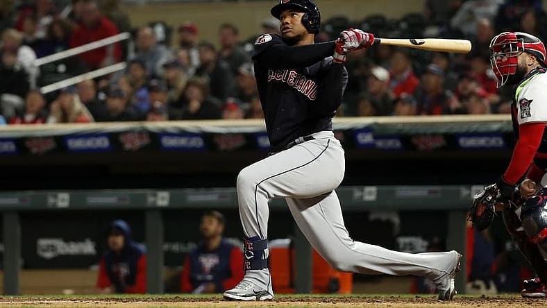 Sep 9, 2022; Minneapolis, Minnesota, USA;  Cleveland Guardians right fielder Oscar Gonzalez (39) hits a home run in the fifth against the Minnesota Twins at Target Field. Mandatory Credit: Bruce Kluckhohn-USA TODAY Sports