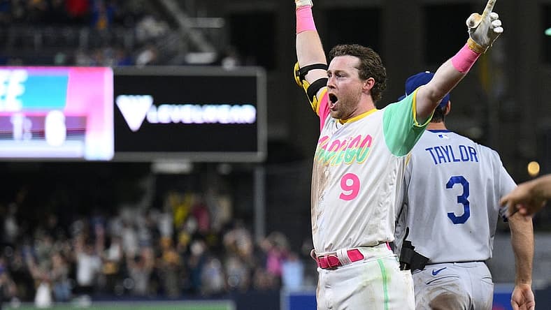 Sep 9, 2022; San Diego, California, USA; San Diego Padres second baseman Jake Cronenworth (9) celebrates after hitting a walk-off single against the Los Angeles Dodgers during the tenth inning at Petco Park. Mandatory Credit: Orlando Ramirez-USA TODAY Sports