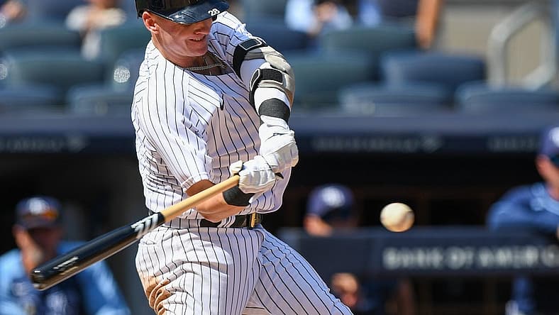 Sep 10, 2022; Bronx, New York, USA; New York Yankees third baseman Josh Donaldson (28) hits a solo home run against the Tampa Bay Rays during the second inning at Yankee Stadium. Mandatory Credit: Dennis Schneidler-USA TODAY Sports