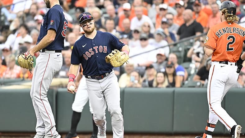 Sep 10, 2022; Baltimore, Maryland, USA; Boston Red Sox second baseman Christian Arroyo (39) competes the forced out of Baltimore Orioles second baseman Gunnar Henderson (2) during the second inning at Oriole Park at Camden Yards. Mandatory Credit: James A. Pittman-USA TODAY Sports