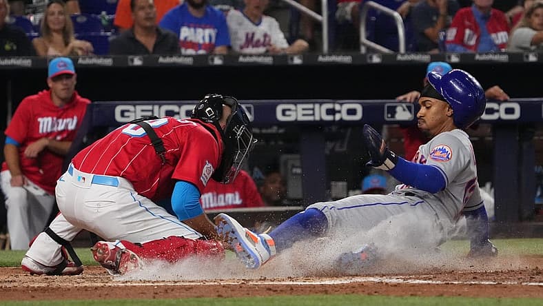 Sep 10, 2022; Miami, Florida, USA; New York Mets shortstop Francisco Lindor (12) scores a run in the third inning against the Miami Marlins at loanDepot park. Mandatory Credit: Jasen Vinlove-USA TODAY Sports