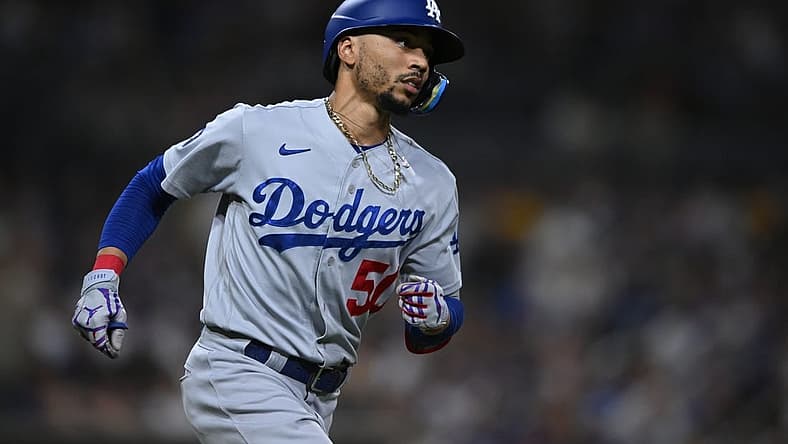 Sep 10, 2022; San Diego, California, USA; Los Angeles Dodgers right fielder Mookie Betts (50) looks on during the eighth inning against the San Diego Padres at Petco Park. Mandatory Credit: Orlando Ramirez-USA TODAY Sports