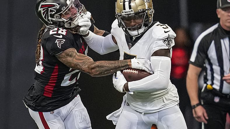 Sep 11, 2022; Atlanta, Georgia, USA; New Orleans Saints wide receiver Jarvis Landry (5) runs against Atlanta Falcons cornerback Mike Ford (28) during the first half at Mercedes-Benz Stadium. Mandatory Credit: Dale Zanine-USA TODAY Sports