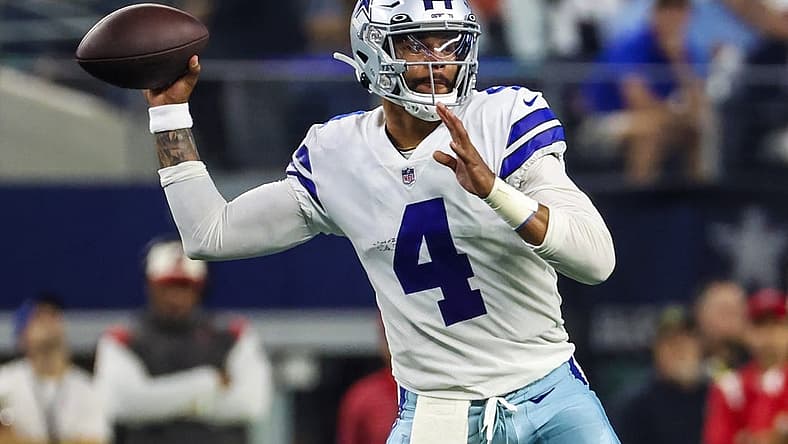 Sep 11, 2022; Arlington, Texas, USA; Dallas Cowboys quarterback Dak Prescott (4) throws during the first quarter against the Tampa Bay Buccaneers at AT&T Stadium. Mandatory Credit: Kevin Jairaj-USA TODAY Sports