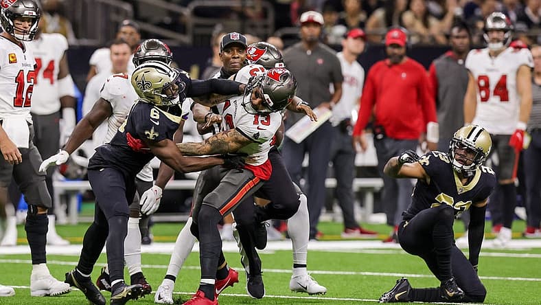 Sep 18, 2022; New Orleans, Louisiana, USA; New Orleans Saints cornerback Marshon Lattimore (23) and safety Marcus Maye (6) get into a penalty with Tampa Bay Buccaneers wide receiver Mike Evans (13) and they are ejected after the play during the second half at Caesars Superdome. Mandatory Credit: Stephen Lew-USA TODAY Sports