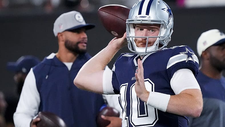 Sep 26, 2022; East Rutherford, New Jersey, USA; Dallas Cowboys quarterback Cooper Rush (10) warms up in front of quarterback Dak Prescott before the game against the New York Giants at MetLife Stadium. Mandatory Credit: Robert Deutsch-USA TODAY Sports