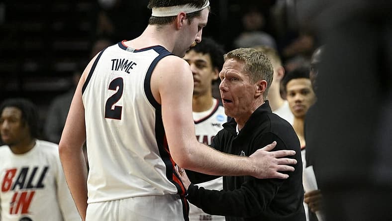 Mar 17, 2022; Portland, OR, USA; Gonzaga Bulldogs forward Drew Timme (2) and head coach Mark Few talk in the secnod half against the Georgia State Panthers during the first round of the 2022 NCAA Tournament at Moda Center. Mandatory Credit: Troy Wayrynen-USA TODAY Sports