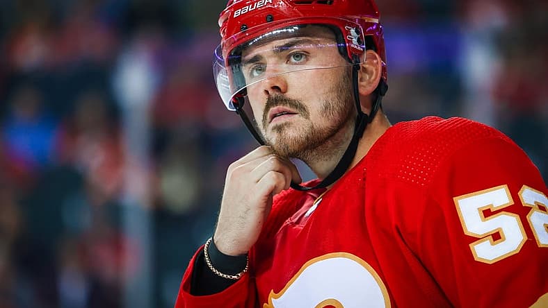 Oct 3, 2022; Calgary, Alberta, CAN; Calgary Flames defenseman MacKenzie Weegar (52) reacts against the Seattle Kraken during the second period at Scotiabank Saddledome. Mandatory Credit: Sergei Belski-USA TODAY Sports