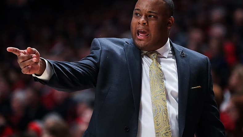 Dec 23, 2019; Dayton, Ohio, USA; Grambling State Tigers head coach Donte' Jackson reacts from the bench against the Dayton Flyers in the first half at University of Dayton Arena. Mandatory Credit: Aaron Doster-USA TODAY Sports