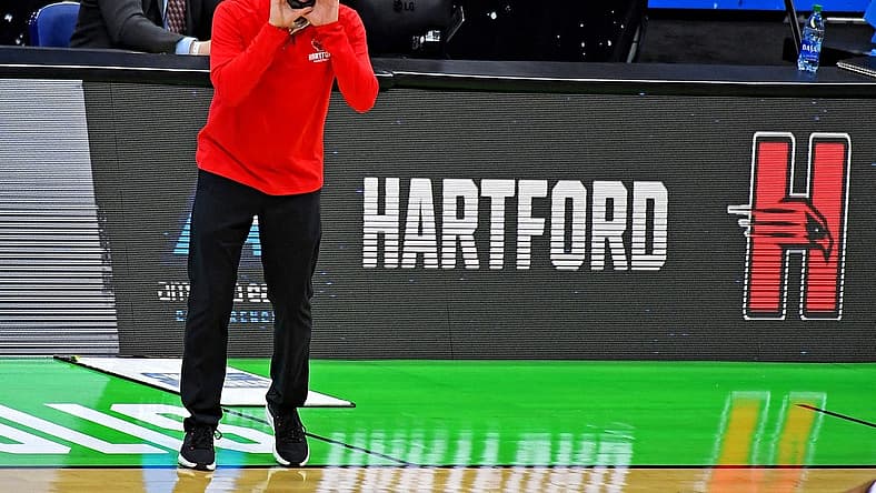 Mar 19, 2021; Indianapolis, Indiana, USA; Hartford Hawks head coach John Gallagher yells out during the first half against the Baylor Bears in the first round of the 2021 NCAA Tournament at Lucas Oil Stadium. Mandatory Credit: Christopher Hanewinckel-USA TODAY Sports