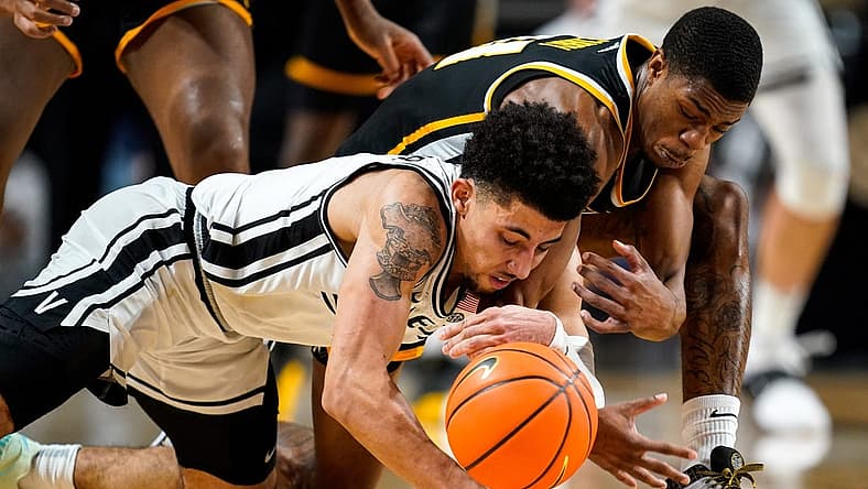 Vanderbilt guard Scotty Pippen Jr. (2) and VCU guard KeShawn Curry (11) dive for the ball during the second half at Memorial Gym in Nashville, Tenn., Wednesday, Nov. 17, 2021.
Vandy Vcu Mbb 111721 Aan 029