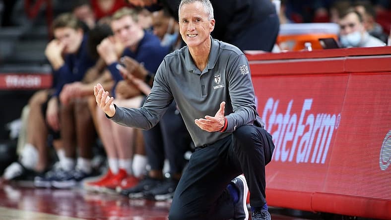 Nov 28, 2021; Fayetteville, Arkansas, USA; Pennsylvania Quakers head coach Steve Donahue reacts to a call during the game against the Arkansas Razorbacks at Bud Walton Arena. Arkansas won 76-60. Mandatory Credit: Nelson Chenault-USA TODAY Sports