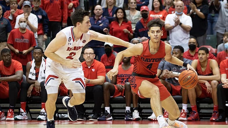 Nov 28, 2021; Orlando, FL, USA; Dayton Flyers guard Koby Brea (4) dribbles the ball against the Belmont Bruins in the second half at HP Field House. Mandatory Credit: Jeremy Reper-USA TODAY Sports