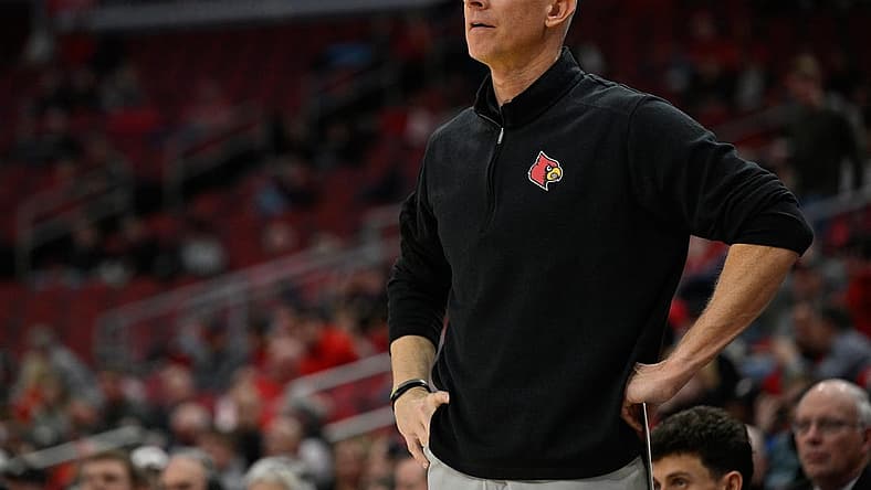 Jan 19, 2022; Louisville, Kentucky, USA; Louisville Cardinals head coach Chris Mack looks on during the second half against Boston College Eagles at KFC Yum! Center. Louisville defeated Boston College 67-54. Mandatory Credit: Jamie Rhodes-USA TODAY Sports