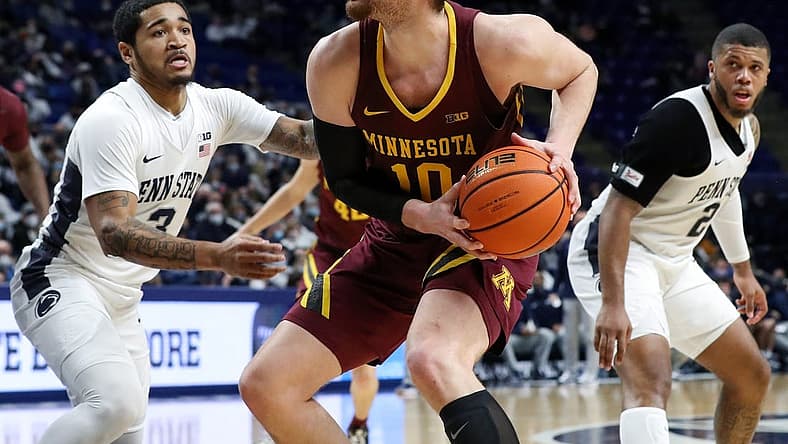 Feb 17, 2022; University Park, Pennsylvania, USA; Minnesota Golden Gophers forward Jamison Battle (10) drives to the basket against Penn State Nittany Lions guard Sam Sessoms (3) during the second half at Bryce Jordan Center. Penn State won 67-46. Mandatory Credit: Matthew OHaren-USA TODAY Sports