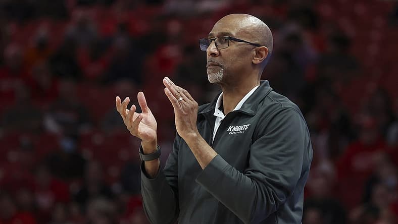 Feb 12, 2022; Houston, Texas, USA; UCF Knights head coach Johnny Dawkins watches play against the Houston Cougars in the second half at Fertitta Center. Mandatory Credit: Thomas Shea-USA TODAY Sports