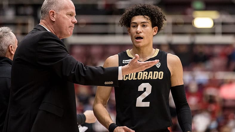 Feb 19, 2022; Stanford, California, USA; Colorado Buffaloes guard KJ Simpson (2) talks to head coach Tad Boyle during the second half against the Stanford Cardinal at Maples Pavilion. Mandatory Credit: John Hefti-USA TODAY Sports
