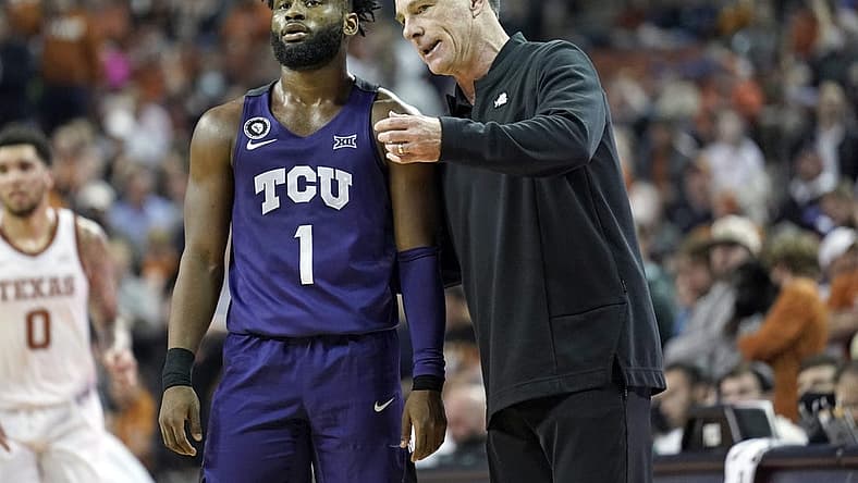 Feb 23, 2022; Austin, Texas, USA; Texas Christian Horned Frogs head coach Jamie Dixon talks with guard Mike Miles Jr. (1) during the second half at Frank C. Erwin Jr. Center. Mandatory Credit: Scott Wachter-USA TODAY Sports