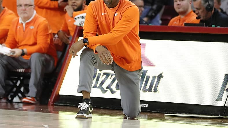Feb 26, 2022; Norman, Oklahoma, USA; Oklahoma State Cowboys head coach Mike Boynton watches his team play against the Oklahoma Sooners during overtime at Lloyd Noble Center. Oklahoma won 66-62 in overtime. Mandatory Credit: Alonzo Adams-USA TODAY Sports