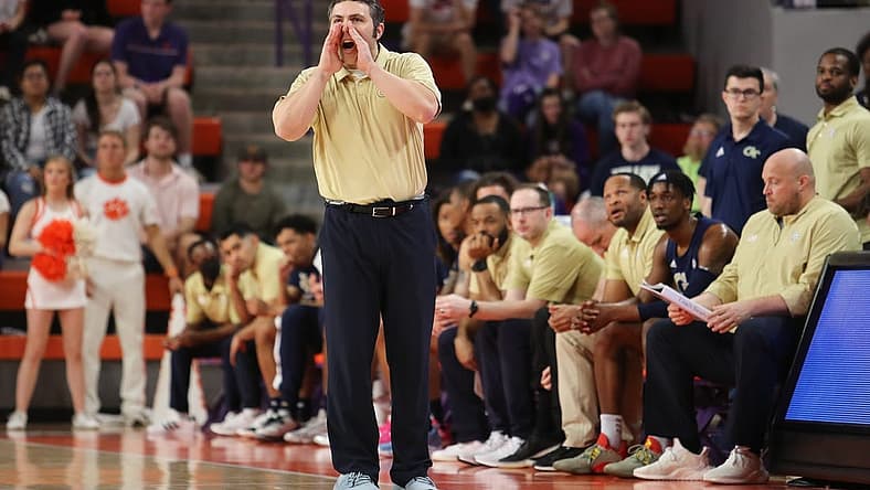 Mar 2, 2022; Clemson, South Carolina, USA; Georgia Tech Yellow Jackets head coach Josh Pastner (front) reacts during the first half against the Clemson Tigers at Littlejohn Coliseum. Mandatory Credit: Dawson Powers-USA TODAY Sports