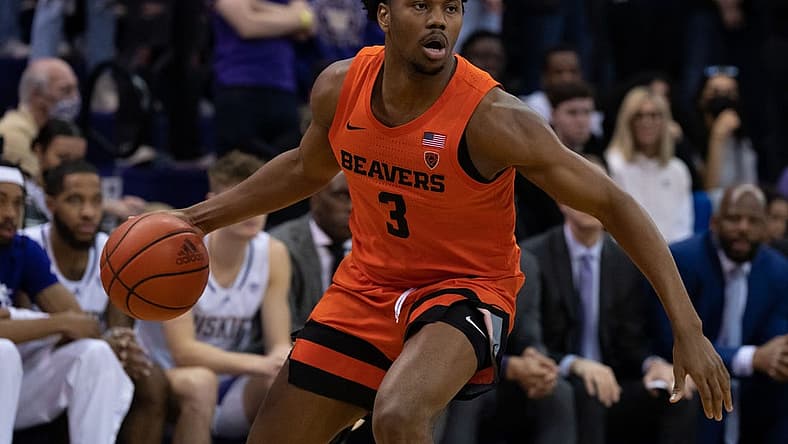 Mar 5, 2022; Seattle, Washington, USA; Oregon State Beavers guard Dexter Akanno (3) dribbles the ball against the Washington Huskies at Alaska Airlines Arena at Hec Edmundson Pavilion. Mandatory Credit: Stephen Brashear-USA TODAY Sports