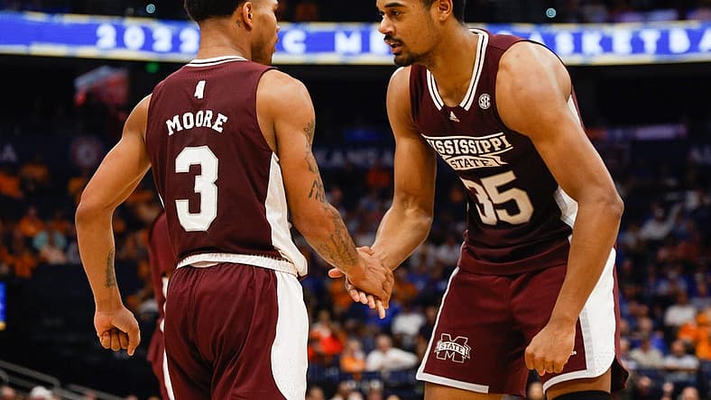 Mar 11, 2022; Tampa, FL, USA; Mississippi State Bulldogs guard Shakeel Moore (3) and forward Tolu Smith (35) react after a basket against the Tennessee Volunteers at Amelie Arena. Mandatory Credit: Nathan Ray Seebeck-USA TODAY Sports