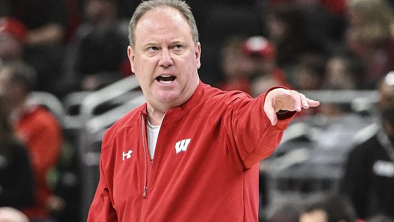 Mar 17, 2022; Milwaukee, WI, USA; Wisconsin Badgers head coach Greg Gard leads the team during practice before the first round of the 2022 NCAA Tournament at Fiserv Forum. Mandatory Credit: Benny Sieu-USA TODAY Sports