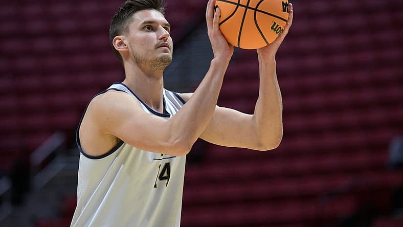 Mar 17, 2022; San Diego, CA, USA; Notre Dame Fighting Irish forward Nate Laszewski (14) shoots a free throw during practice before the first round of the 2022 NCAA Tournament at Viejas Arena. Mandatory Credit: Orlando Ramirez-USA TODAY Sports