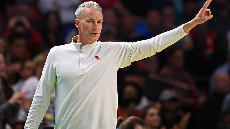 Mar 18, 2022; Greenville, SC, USA; Southern California Trojans head coach Andy Enfield gestures against the Miami Hurricanes during the first round of the 2022 NCAA Tournament at Bon Secours Wellness Arena. Mandatory Credit: Bob Donnan-USA TODAY Sports