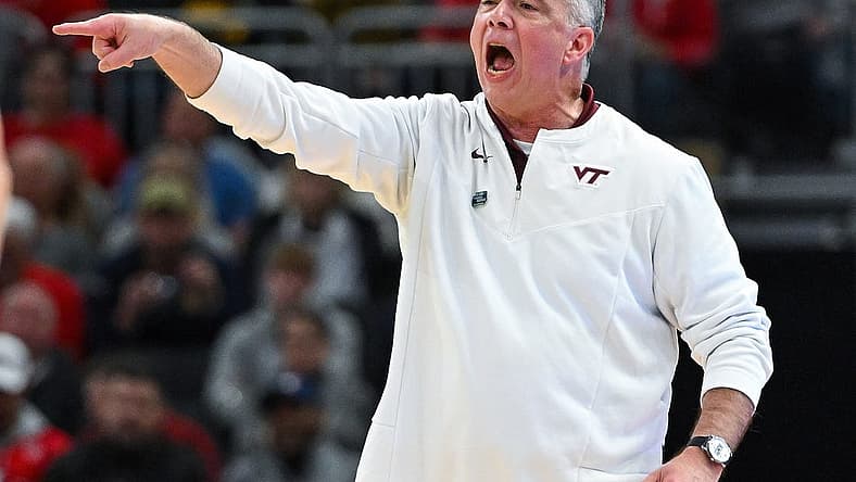 Mar 18, 2022; Milwaukee, WI, USA; Virginia Tech Hokies head coach Mike Young reacts during the first half against the Texas Longhorns in the first round of the 2022 NCAA Tournament at Fiserv Forum. Mandatory Credit: Benny Sieu-USA TODAY Sports