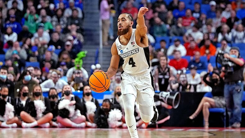 Mar 19, 2022; Buffalo, NY, USA; Providence Friars guard Jared Bynum (4) brings the ball up court during the first half against the Richmond Spiders during the second round of the 2022 NCAA Tournament at KeyBank Center. Mandatory Credit: Gregory Fisher-USA TODAY Sports