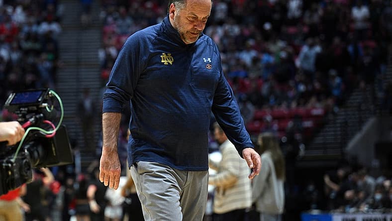 Mar 20, 2022; San Diego, CA, USA; Notre Dame Fighting Irish head coach Mike Brey leaves the court after the Texas Tech Red Raiders defeated the Notre Dame Fighting Irish during the second round of the 2022 NCAA Tournament at Viejas Arena. Mandatory Credit: Orlando Ramirez-USA TODAY Sports