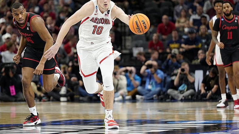 Mar 24, 2022; San Antonio, TX, USA; Arizona Wildcats forward Azuolas Tubelis (10) drives to the basket against Houston Cougars during the first half in the semifinals of the South regional of the men's college basketball NCAA Tournament at AT&T Center. Mandatory Credit: Scott Wachter-USA TODAY Sports
