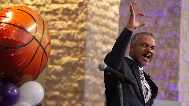 Jerome Tang, Kansas State   s new men   s basketball coach, forms a Powercat with his hands Thursday, March 24, 2022, during his introduction press conference.