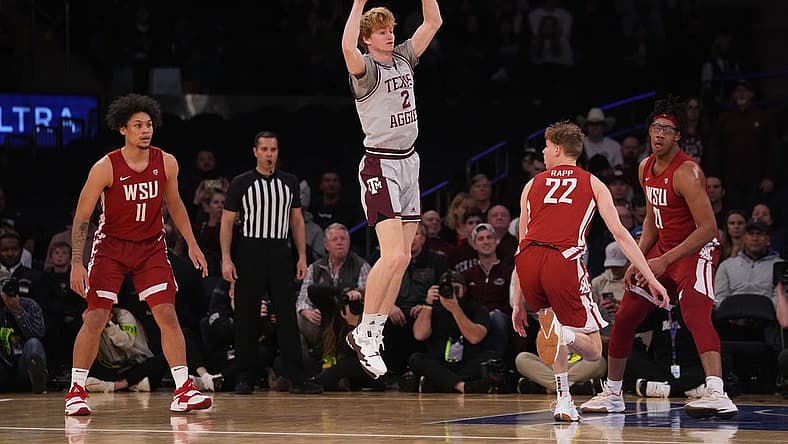 Mar 29, 2022; New York, New York, USA; Texas A&M Aggies guard Hayden Hefner (2) passes the ball against the Washington State Cougars during the second half of the NIT college basketball semifinals at Madison Square Garden. Mandatory Credit: Gregory Fisher-USA TODAY Sports