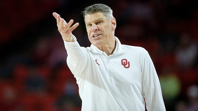 Oklahoma coach Porter Moser shouts during a men's Big 12 basketball game between the University of Oklahoma Sooners (OU) and the West Virginia Mountaineers at Lloyd Noble Center in Norman, Okla., Tuesday, March 1, 2022. Oklahoma won 72-59.
cutout