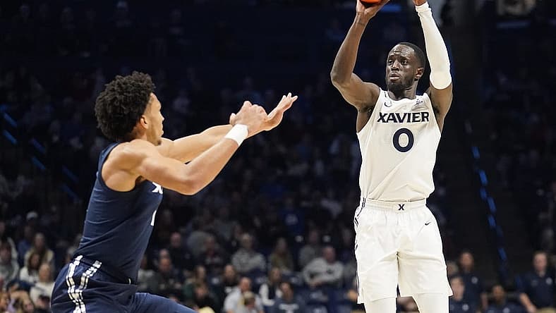 Xavier White guard Souley Boum (0) shoots in the first half of a scrimmage during Xavier Basketball        s Musketeer Madness on Friday, Oct. 21, 2022 at the Cintas Center in Cincinnati.

Ncaa Basketball Xavier Musketeer Madness