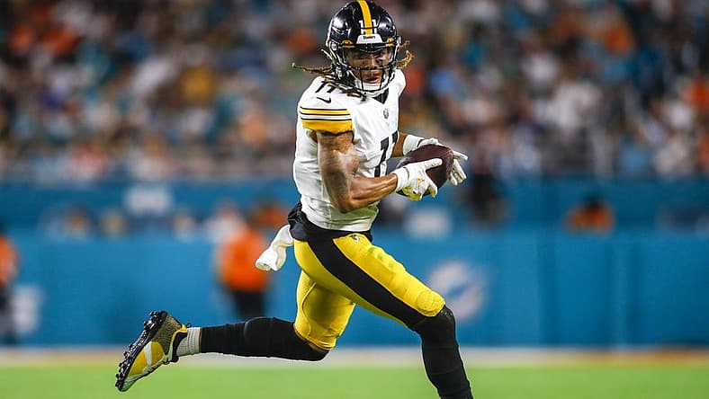 Oct 23, 2022; Miami Gardens, Florida, USA; Pittsburgh Steelers wide receiver Chase Claypool (11) runs with the football during the second quarter against the Miami Dolphins at Hard Rock Stadium. Mandatory Credit: Sam Navarro-USA TODAY Sports