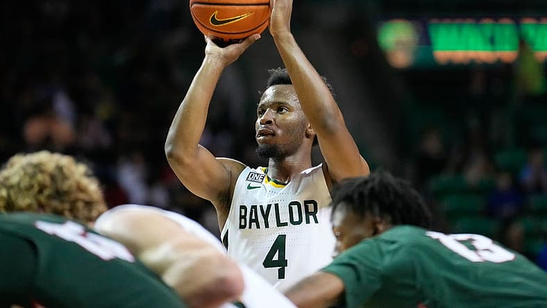 Nov 7, 2022; Waco, Texas, USA; Baylor Bears guard LJ Cryer (4) makes a free throw against the Mississippi Valley State Delta Devils during the first half at Ferrell Center. Mandatory Credit: Chris Jones-USA TODAY Sports