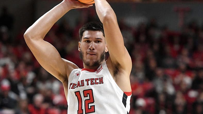 Texas Tech's forward Daniel Batcho (12) looks to pass the ball against Northwestern State in a basketball game, Monday, Nov. 7, 2022, at United Supermarkets Arena.