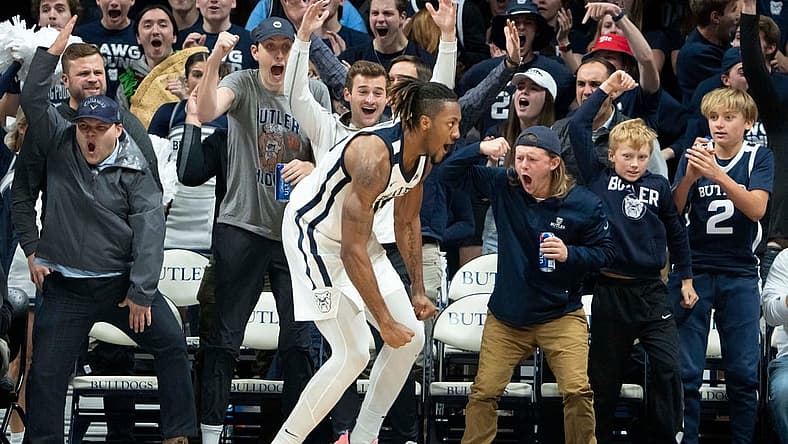 Butler Bulldogs fans celebrate with Butler Bulldogs center Manny Bates (15) after throwing down a dunk Monday, Nov. 7, 2022, at Hinkle Fieldhouse in Indianapolis.
Butler 11072022 Af037
