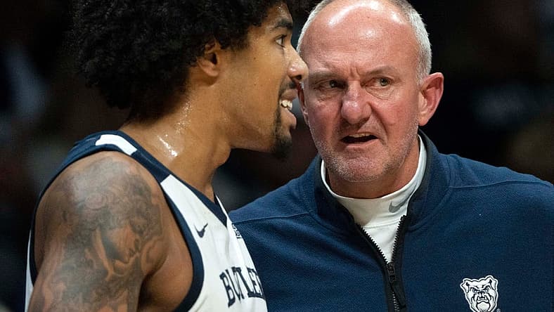 Butler Bulldogs head coach Thad Matta speaks with Butler Bulldogs forward D.J. Hughes (0) on Monday, Nov. 7, 2022, at Hinkle Fieldhouse in Indianapolis.
Butler 11072022 Af034