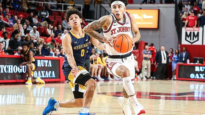 Nov 7, 2022; Queens, New York, USA;  St. John's Red Storm guard Andre Curbelo (3) and Merrimack Warriors guard Chevalier Emery (0) at Carnesecca Arena. Mandatory Credit: Wendell Cruz-USA TODAY Sports