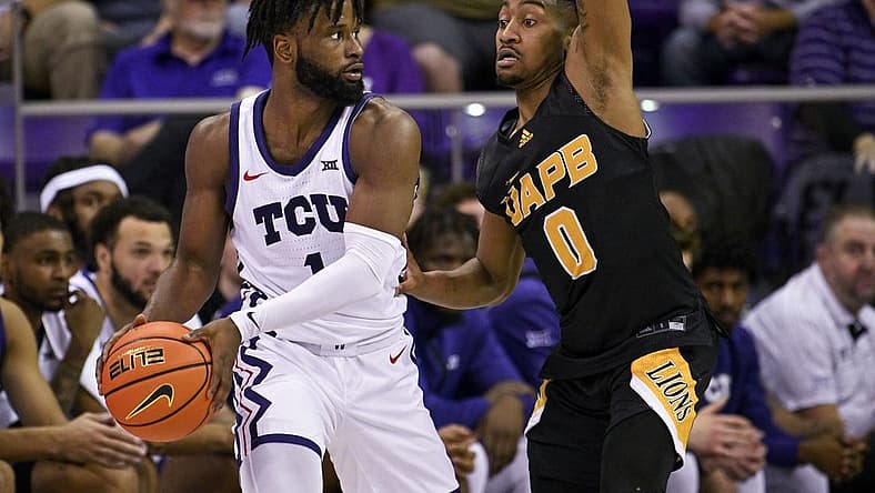 Nov 7, 2022; Fort Worth, Texas, USA; TCU Horned Frogs guard Mike Miles Jr. (1) and Arkansas-Pine Bluff Golden Lions guard Trejon Ware (0) in action during the game between the TCU Horned Frogs and the Arkansas-Pine Bluff Golden Lions at Ed and Rae Schollmaier Arena. Mandatory Credit: Jerome Miron-USA TODAY Sports