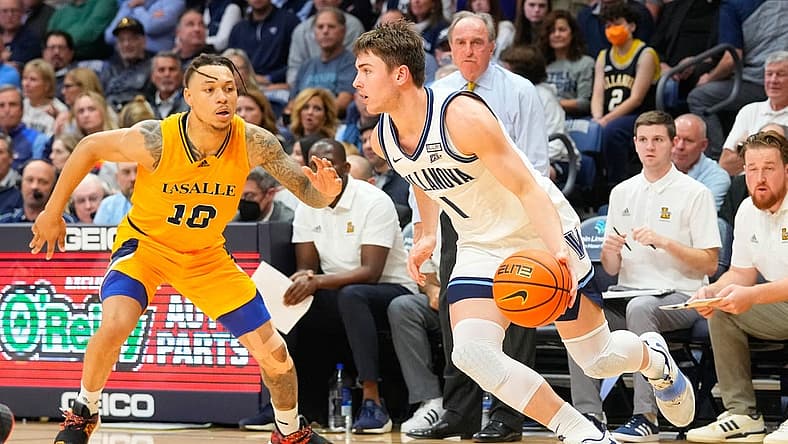 Nov 7, 2022; Villanova, Pennsylvania, USA; Villanova Wildcats guard Brendan Hausen (1) dribbles the ball against La Salle Explorers guard Josh Nickelberry (10) during the second half at William B. Finneran Pavilion. Mandatory Credit: Gregory Fisher-USA TODAY Sports