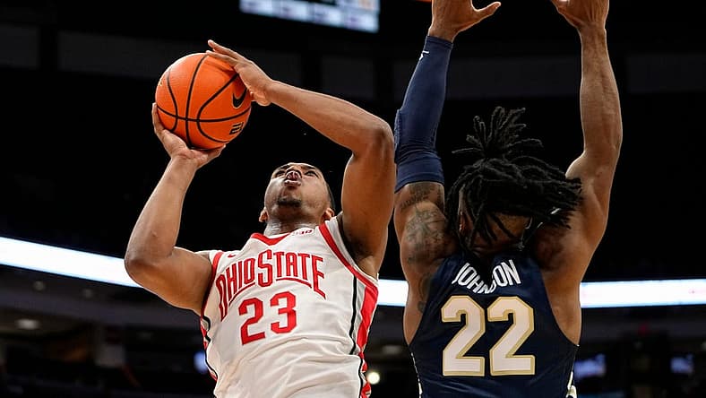Nov 10, 2022; Columbus, OH, USA; Ohio State Buckeyes guard Zed Key (23) shoots over Charleston Southern Buccaneers guard RJ Johnson (22) during the first half of the NCAA men's basketball game at Value City Arena. Mandatory Credit: Adam Cairns-The Columbus Dispatch
Charleston Southern At Ohio State Men S Basketball
