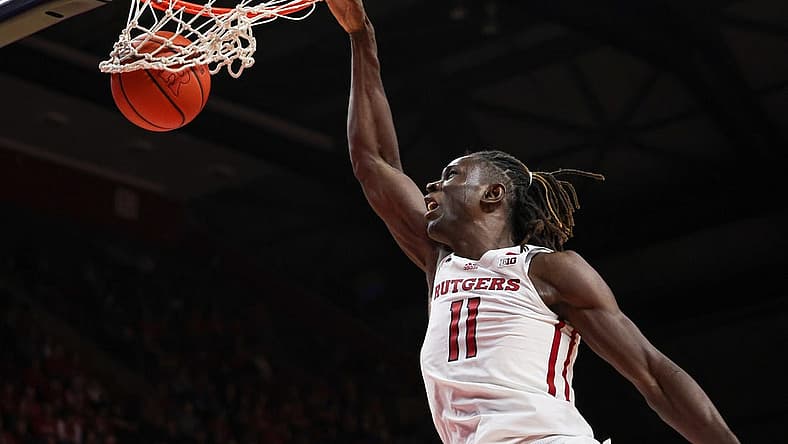 Nov 10, 2022; Piscataway, New Jersey, USA; Rutgers Scarlet Knights center Clifford Omoruyi (11) dunks against the Sacred Heart Pioneers during the second half at Jersey Mike's Arena. Mandatory Credit: Vincent Carchietta-USA TODAY Sports